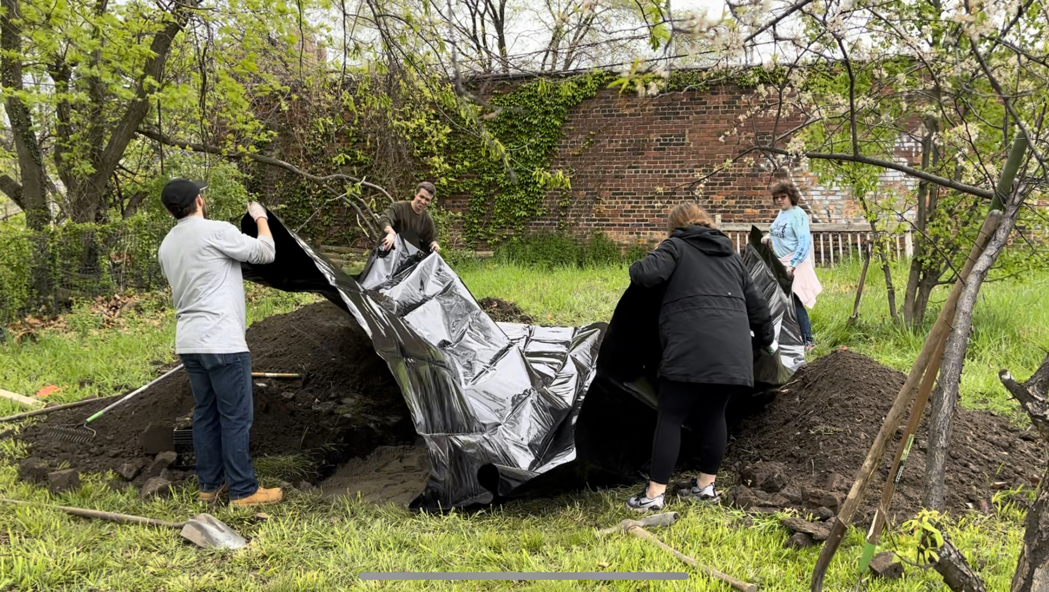 Garden implementation with raised beds and native plantings